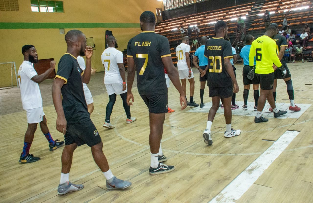 Players warming up for a futsal game